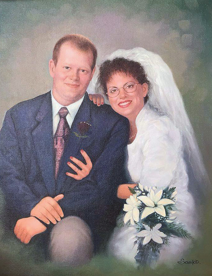 Une peinture à l'huile d'un marié et de sa mariée
